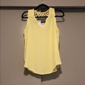 Yellow tank top with cut outs